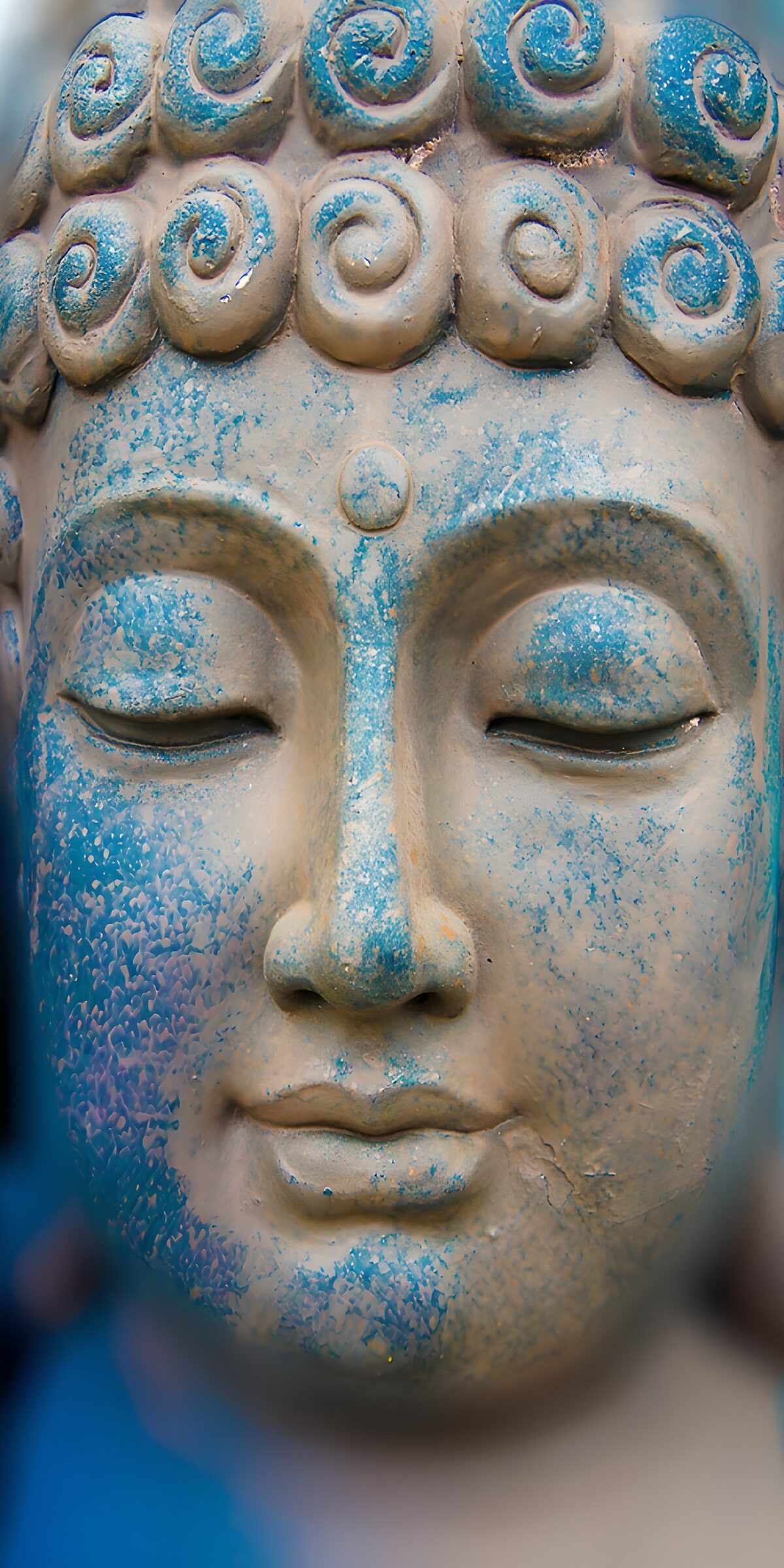 Buddha-Gesicht in Türkis und Beige
